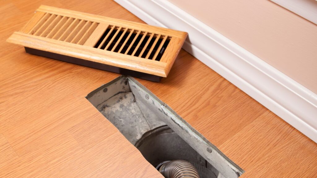a close up look of an air duct with pipe
