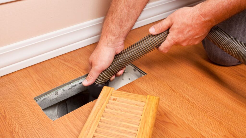 cleaning air duct using vacuum cleaner