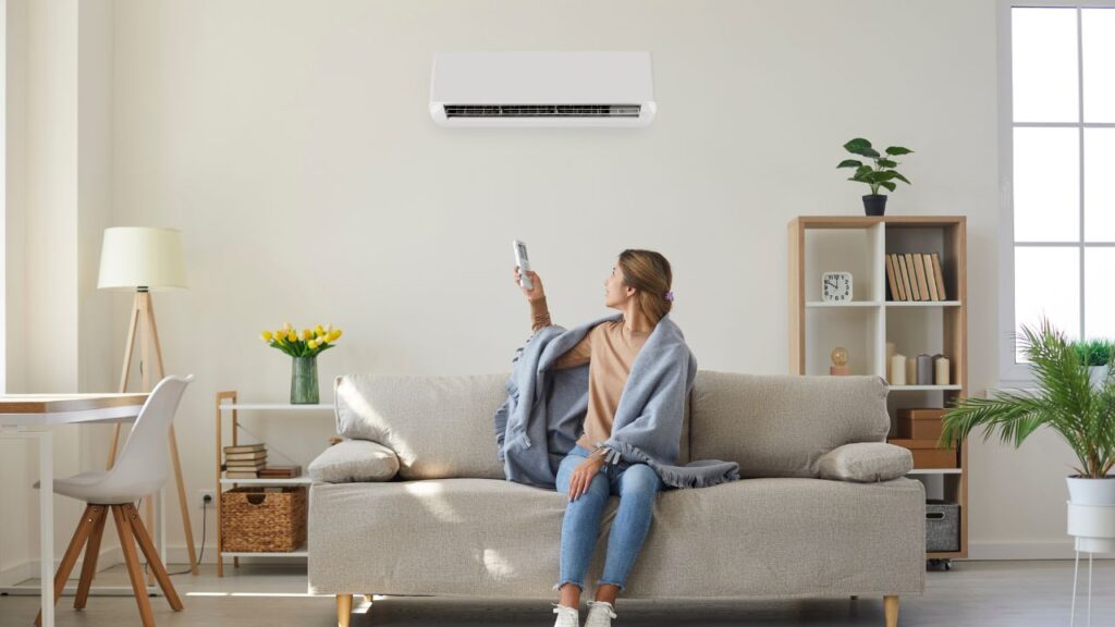 staying at home cooling off with ac during summer with air ducts