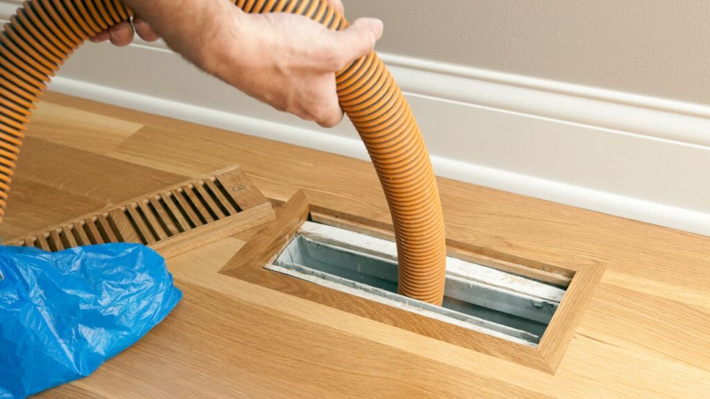 suction method to hook toys from air duct vent